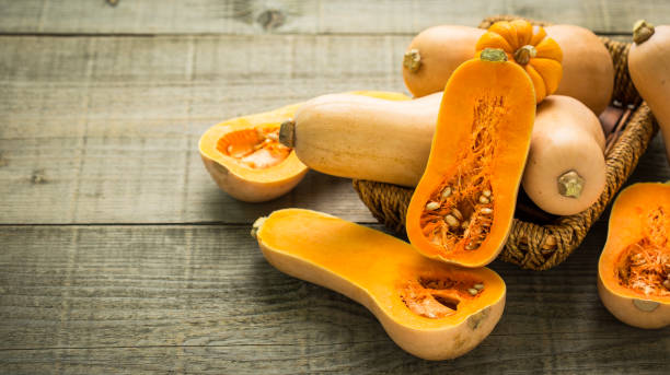 istock Fresh butternut squash on the wooden table 1255935513