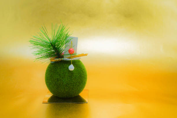 Gold folding screen and a small bonsai of (New Years card material). Shooting Location: Yokohama-city kanagawa prefecture