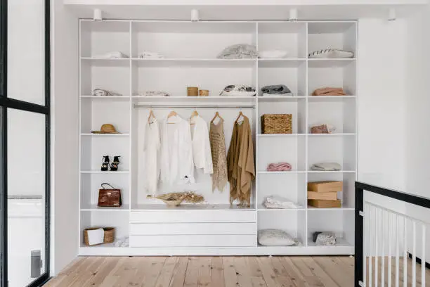 Photo of Modern and large wardrobe in dressing room