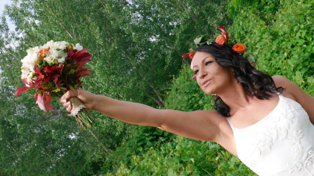 istock The bride and her bouquet. 1255941053