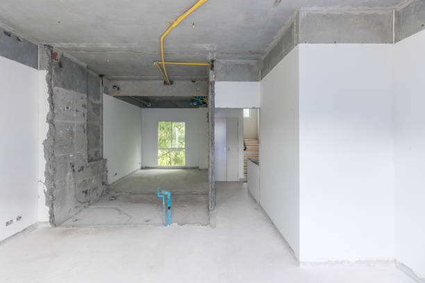 istock Construction site of empty Interior space, unfinished building after demolition process. Home improvement and renovation business. 1255941732