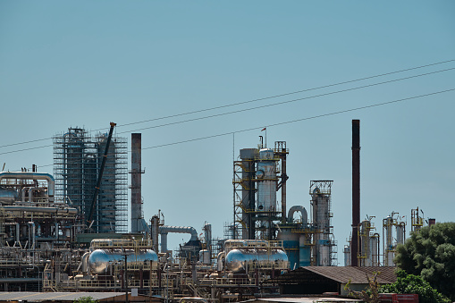 Industrial complex, detail of pipes, chimneys and tanks