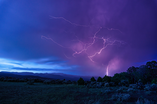 Lightning Strike Stormy Weather Scenic Landscape - Bolts of lightning and ominous storm clouds.