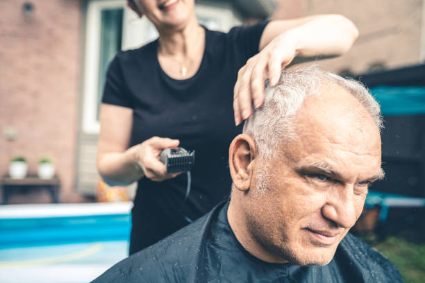 istock Married couple home grooming 1255948162