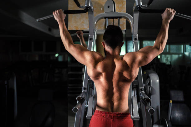 istock Handsome young man in the gym 1255948445