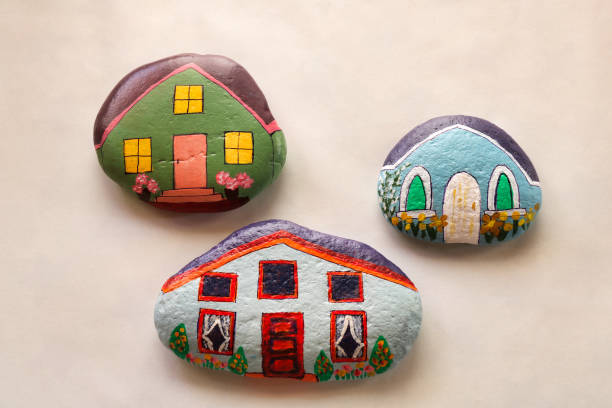 istock three painted stones in the shape of home as leisure activity 1255949614