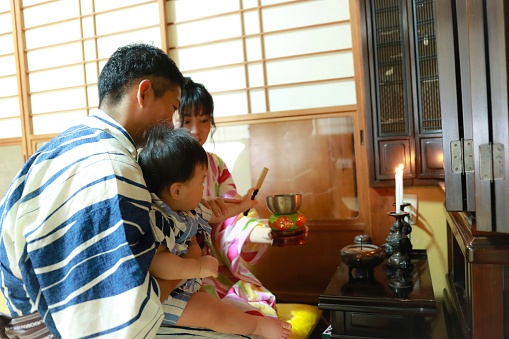 Japanese family staying at home while Obon (お盆) season in summer. お盆に帰省