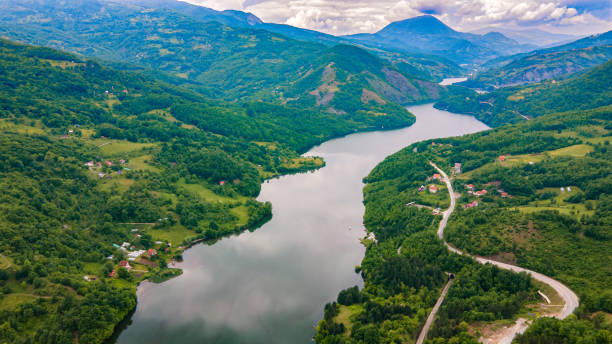 istock River and mountains on sunset stock photo 1255953588