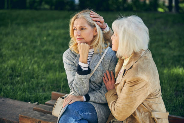 istock Two Caucasian women thinking about something in the part 1255953991
