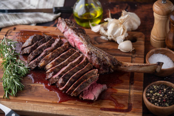 istock grilled tomahawk steak on wooden board 1255956313
