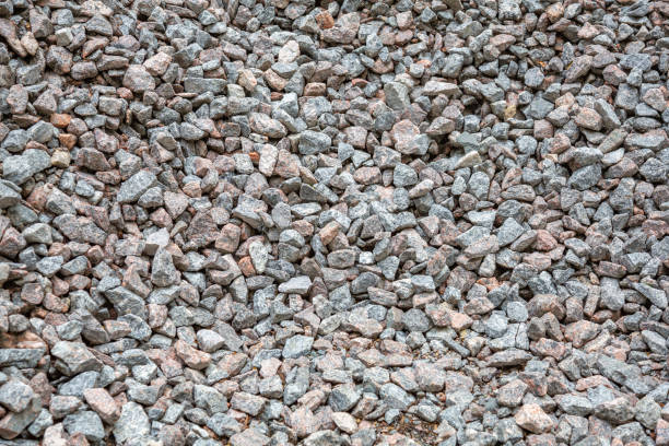 istock Texture of fine gray building pebbles and stones 1255960775