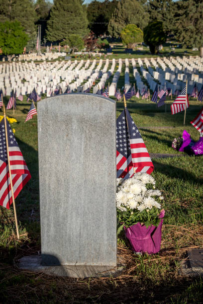 istock Military Headstones Decorated with Flags for Memorial Day 1255962287