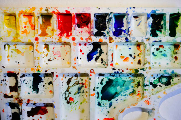 istock Watercolour palette with brushes, India 1255962450