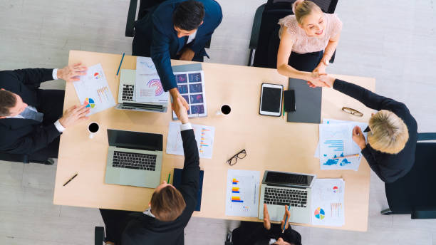 istock Business people group meeting shot from top view 1255963848