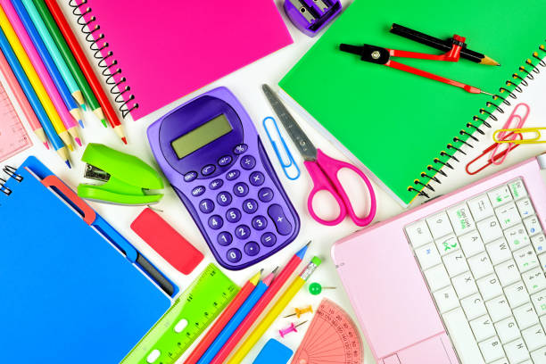 istock School supplies top view desk scene over a white background 1255964999