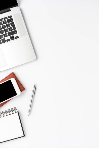 istock Modern workplace with laptop and accessories. Office desktop 1255965290