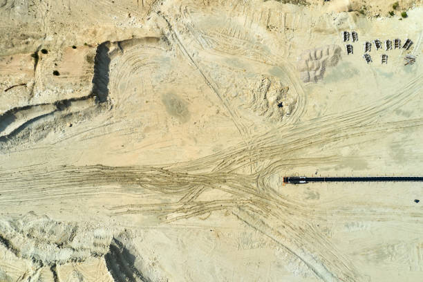 istock Top view of opencast coal mining quarry Natural texture. 1255966655