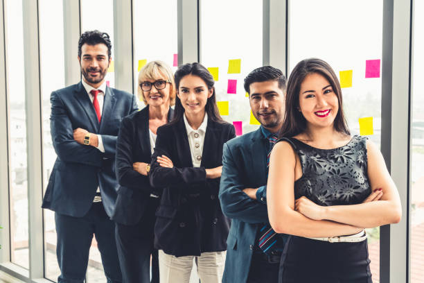 istock Successful business people standing together 1255983087