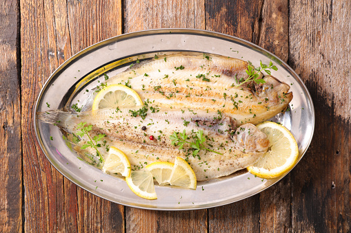 fish fillet cooked with lemon and parsley