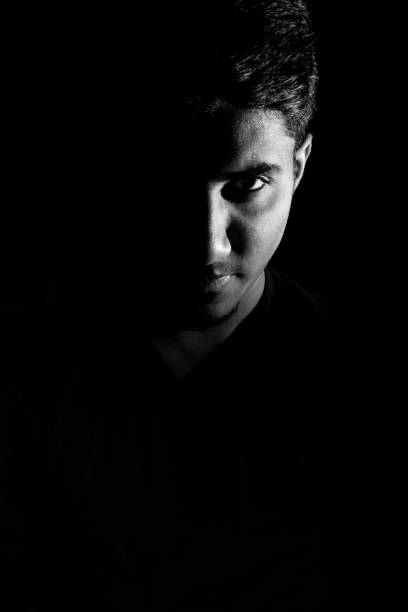 istock Confident looking of a young man dramatic low key black and white portrait 1255984178