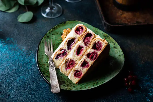 Cherry cake. Traditional russian dessert. Piece of cake. Berries, dessert. Red currant