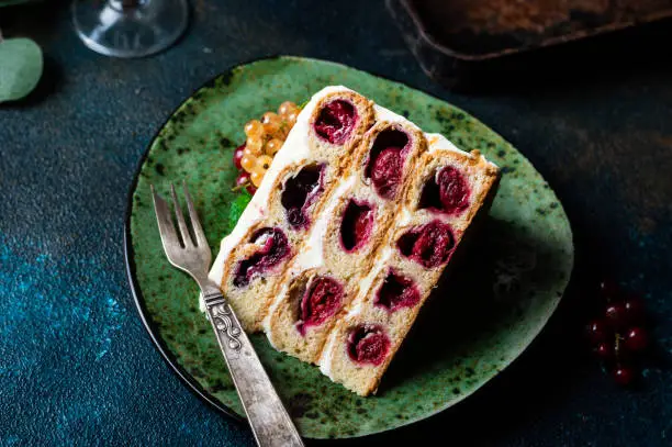 Cherry cake. Traditional russian dessert. Piece of cake. Berries, dessert. Red currant