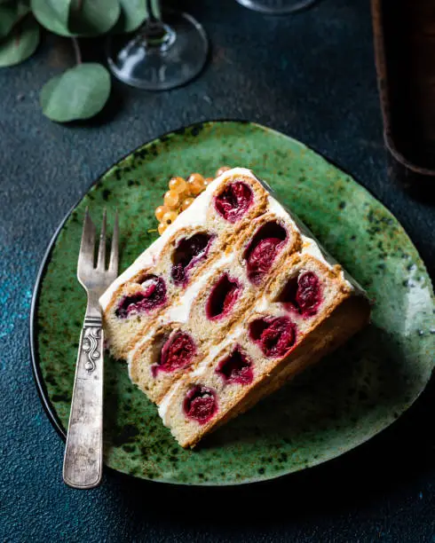 Cherry cake. Traditional russian dessert. Piece of cake. Berries, dessert. Red currant