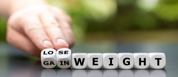istock Hand turns dice and changes the expression 
