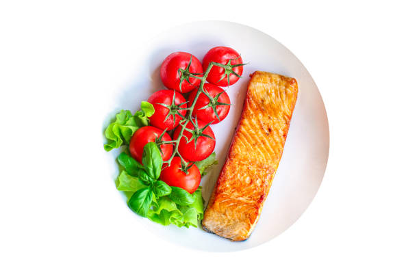 istock salmon barbecue grill fried Menu concept serving size. food background top view copy space for text keto or paleo pescatarian diet 1255992873