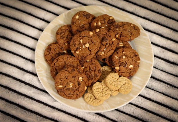 istock Delicious white and black chocolate chip cookies. 1255993149