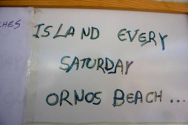 istock Arrival Departure Board in Mykonos, Greece 1255993160