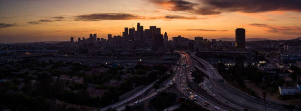 istock Aerial Panorama of Freeway Interchange and DTLA Skyline at Dusk 1255993823
