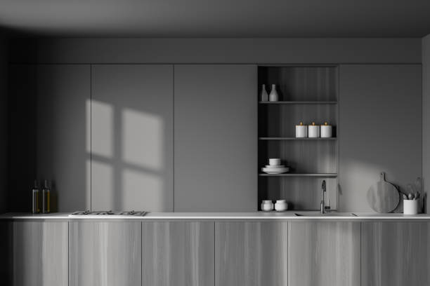 istock Wooden countertops in grey kitchen 1255996636