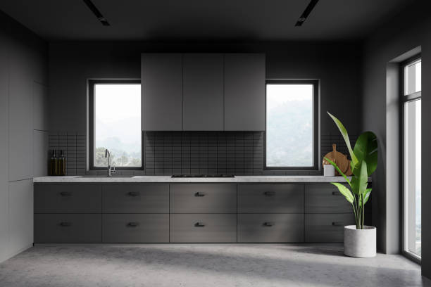 istock Grey kitchen interior with wooden countertop 1255997484