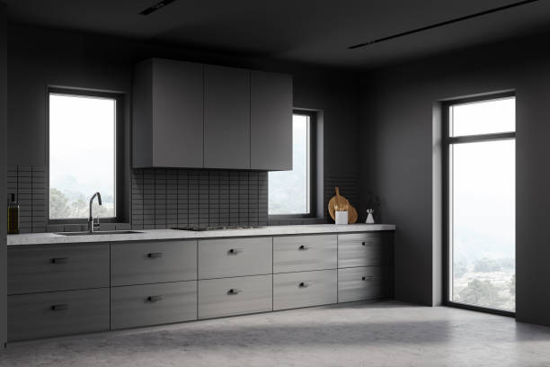 istock Grey kitchen corner with wooden countertop 1255997497
