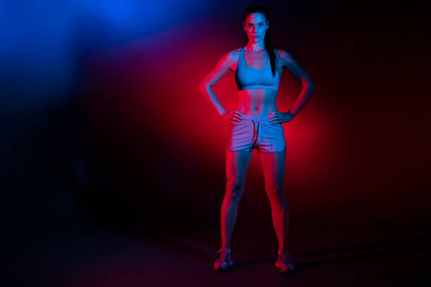 Studio portrait of a beautiful young Caucasian sportswoman looking at the camera with confidence.