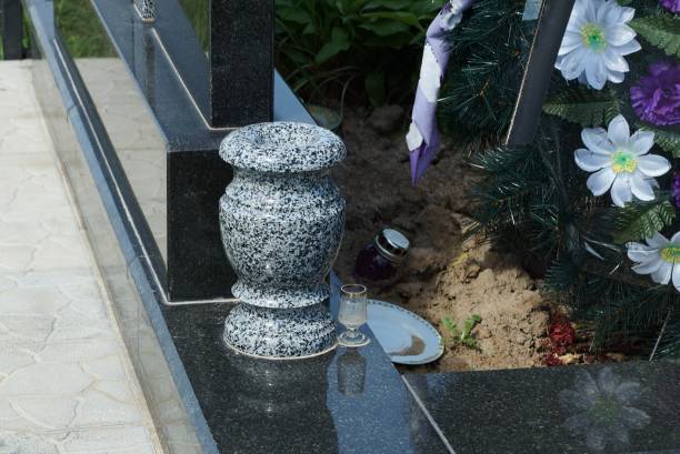 istock one empty gray stone vase stands on a black marble slab 1255997685