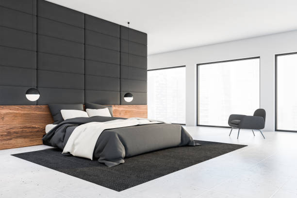 istock Grey tile and white bedroom corner with armchair 1255998322