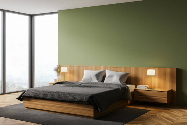 istock Green master bedroom corner with window 1255998339
