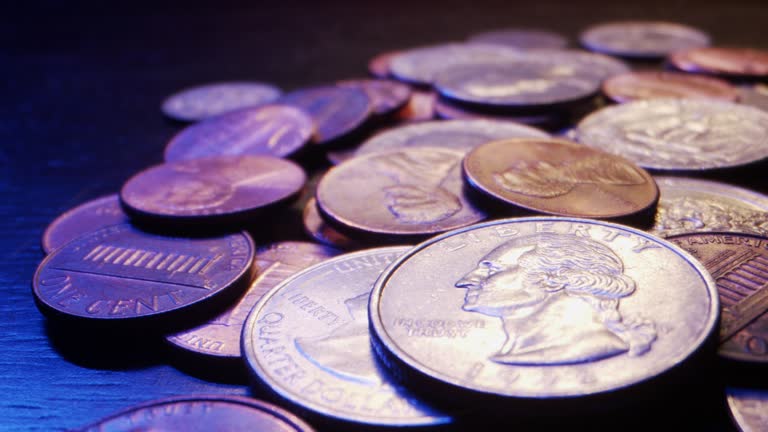 Close-Up Macro Moving Slider Shot of a Pile of American Currency Coins