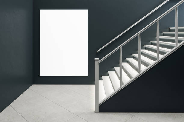 istock Gray concrete hall interior with blank placard on wall. 1256001870