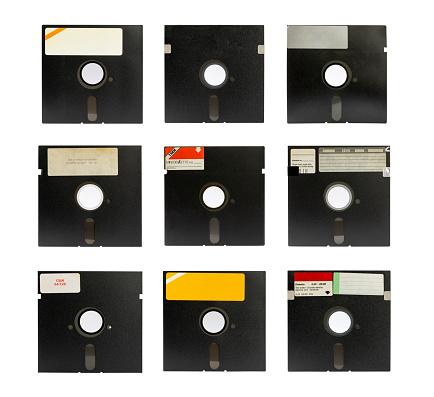 Series of old retro floppy disks 5.25 on a white background, retro style