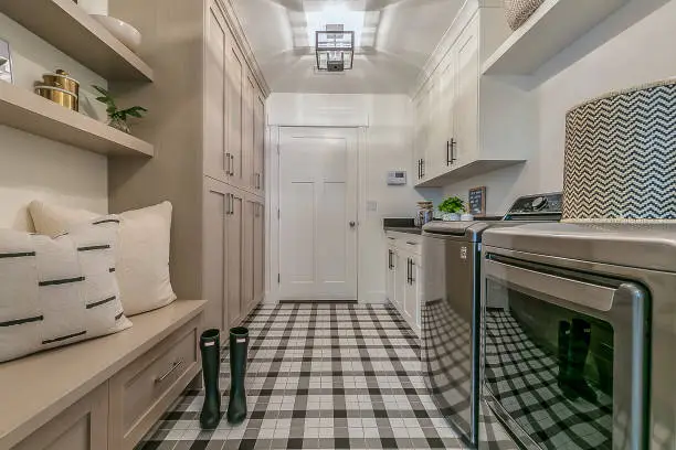 Photo of Immaculate mudroom and laundry room combo