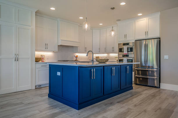 istock Gorgeous spark of blue among mostly white kitchen 1256017170