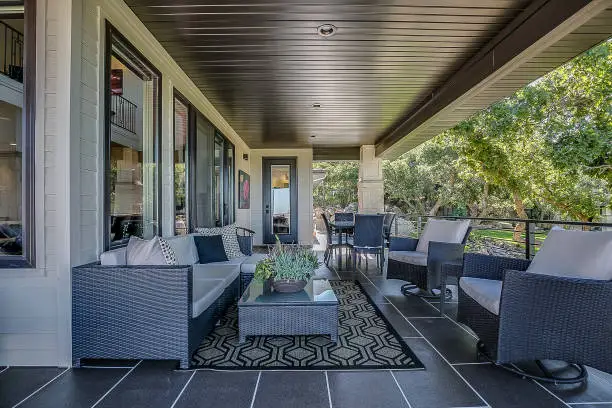 Photo of Covered patio deck with an ample amount of seating
