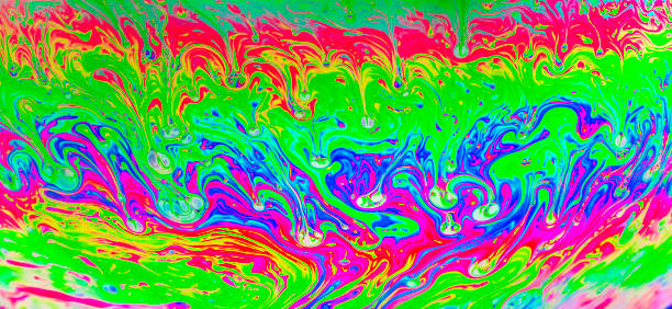 istock Rainbow colors created by soap, bubble,or oil 1256019686