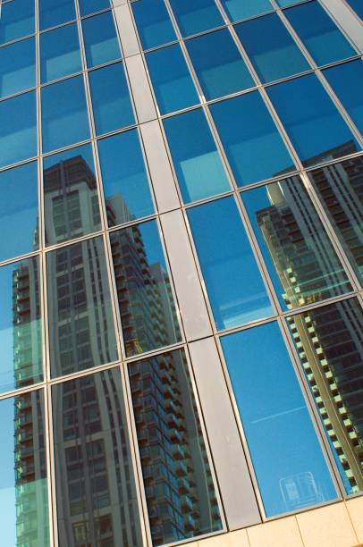 istock reflections in glass and steel 1256021229