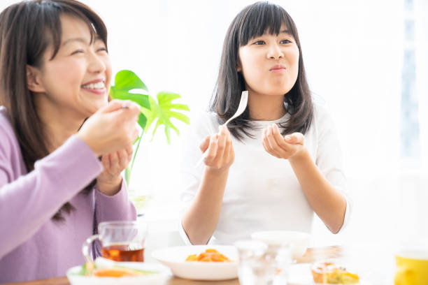 istock asian parent and daughter 1256023767