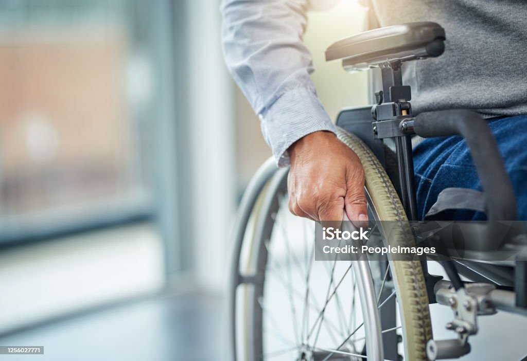 My wheelchair gave me my independence back Cropped shot of an unrecognisable senior man in a wheelchair Wheelchair Stock Photo