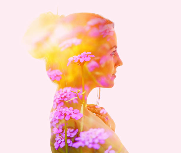 istock Multiple Exposure of woman and flowers 1256028799